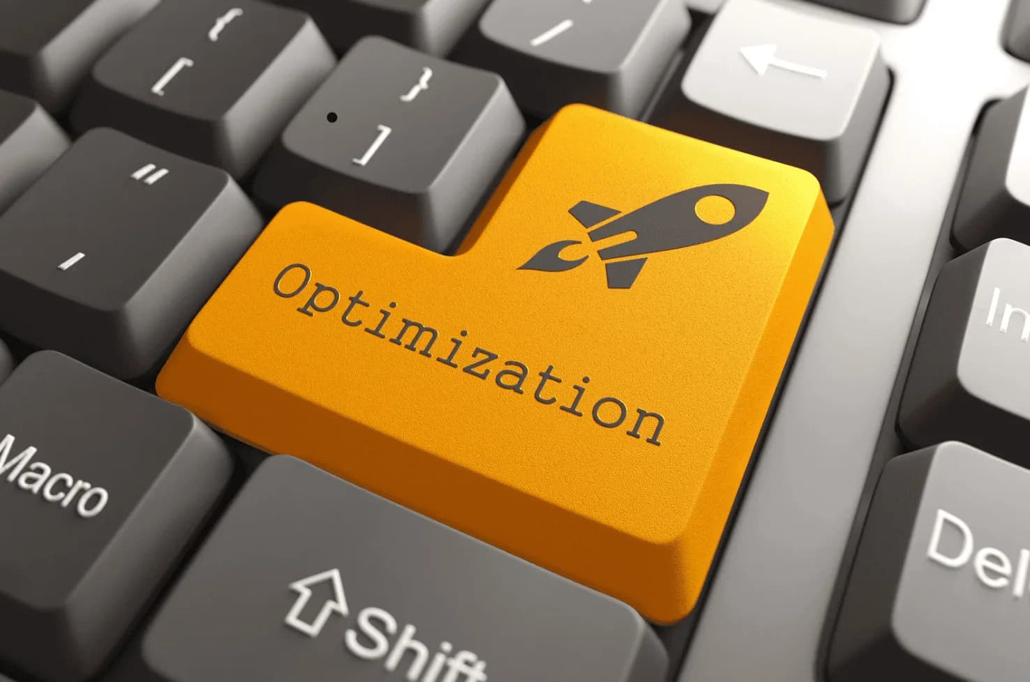 Close-up of a computer keyboard with a bright orange key labelled “Optimization” symbolising ASIN-level Amazon ad optimisation.