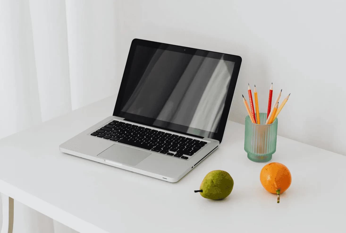 Clean minimalist workspace with laptop for Amazon PPC campaign optimization and management